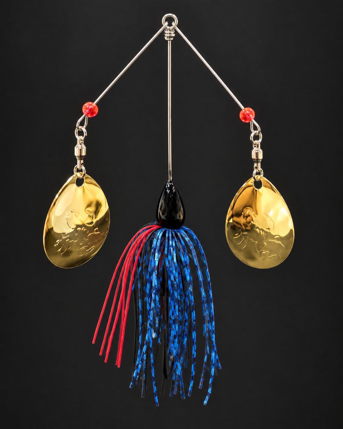 Double-arm spinnerbait with a blue, red and black skirt and two gold-colored blades.